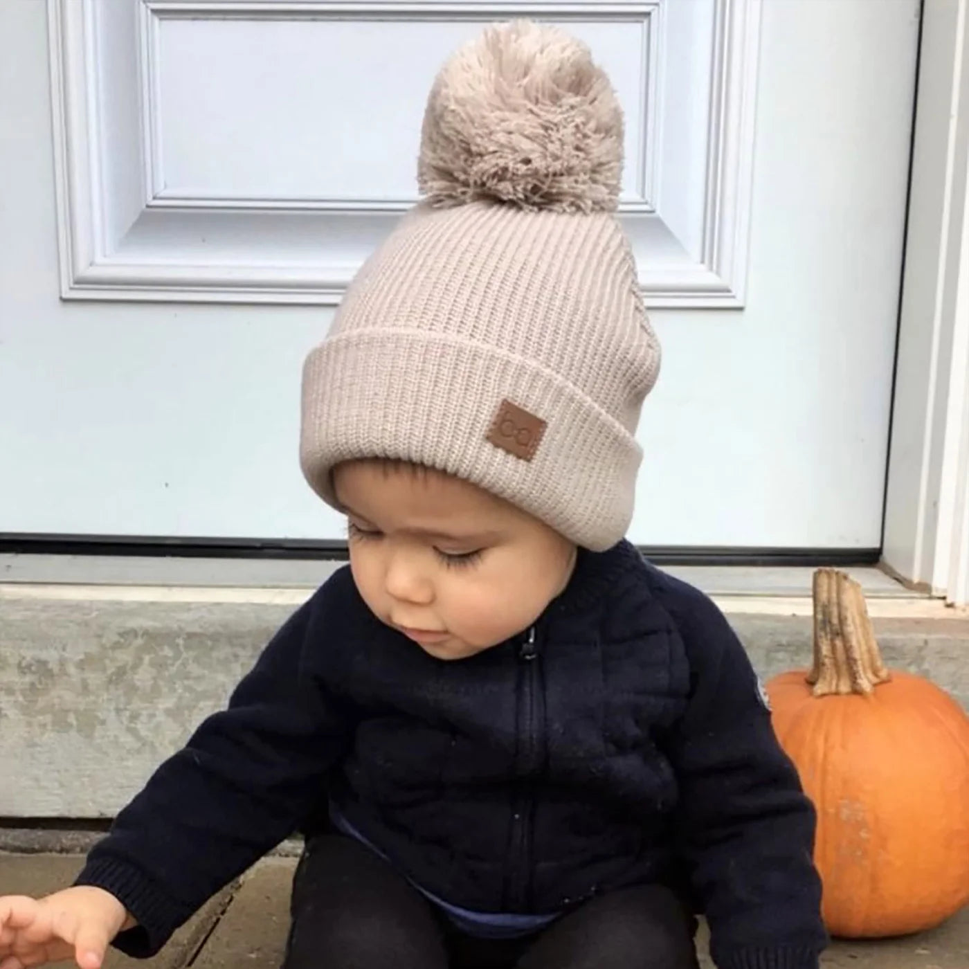 TUQUE EN TRICOT - À POMPON - Institut MAIA