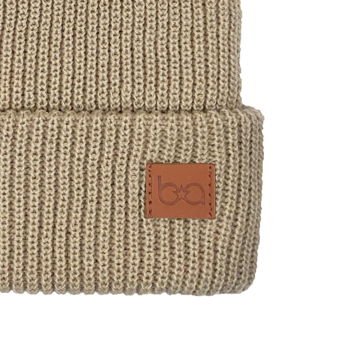 TUQUE EN TRICOT - À POMPON - Institut MAIA