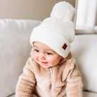 TUQUE EN TRICOT - À POMPON - Institut MAIA
